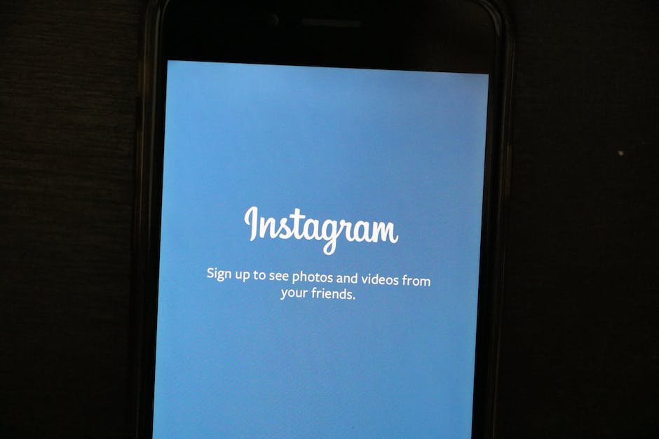 Image of someone using Instagram on their smartphone to represent using Instagram for business purposes